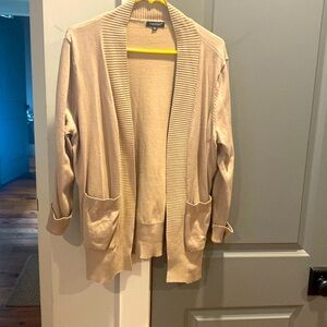 Tan cardigan.